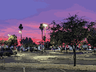 Processed purple sunset in a parking lot